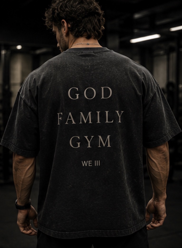 Model wearing the washed black WE III God Family Gym tee